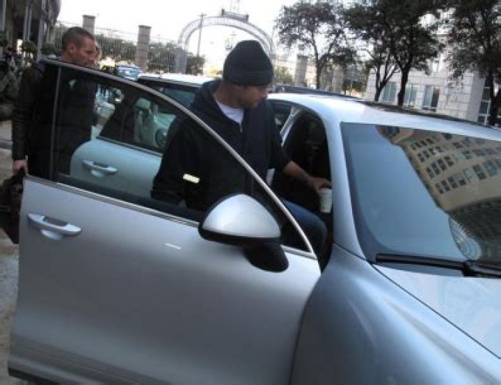 Andy Roddick with his car