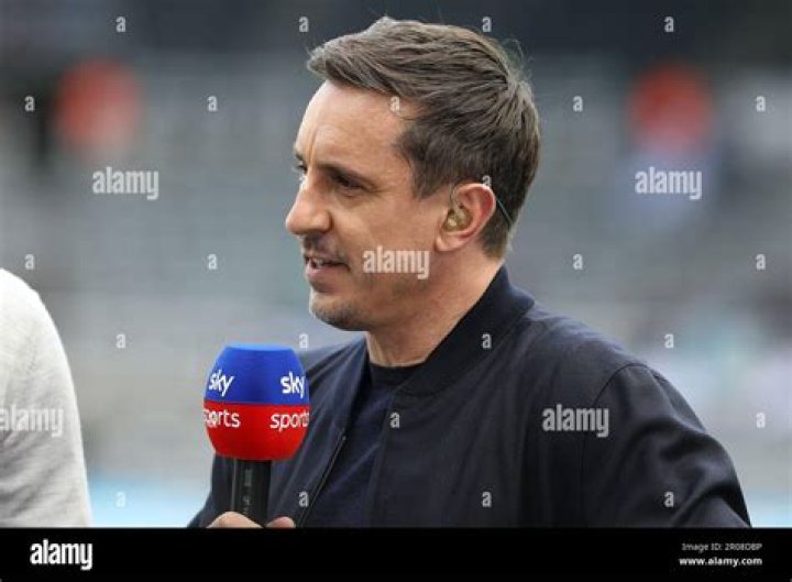Gary Neville photographed while coaching a player.