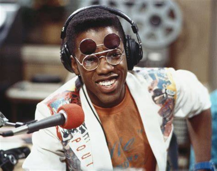 Kadeem Hardison wearing headset and sunglass.